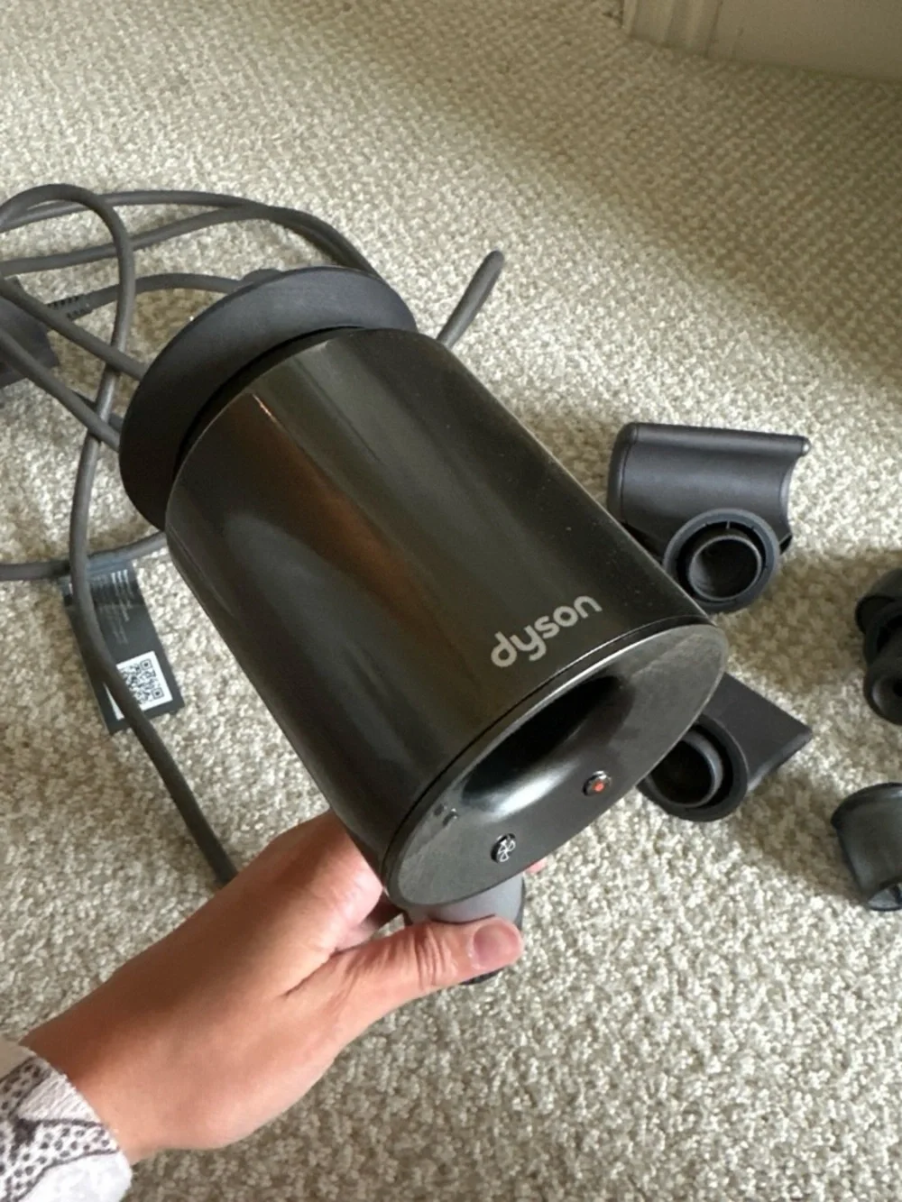 Dyson Black and Silver Hair Dryer with Multiple Attachments